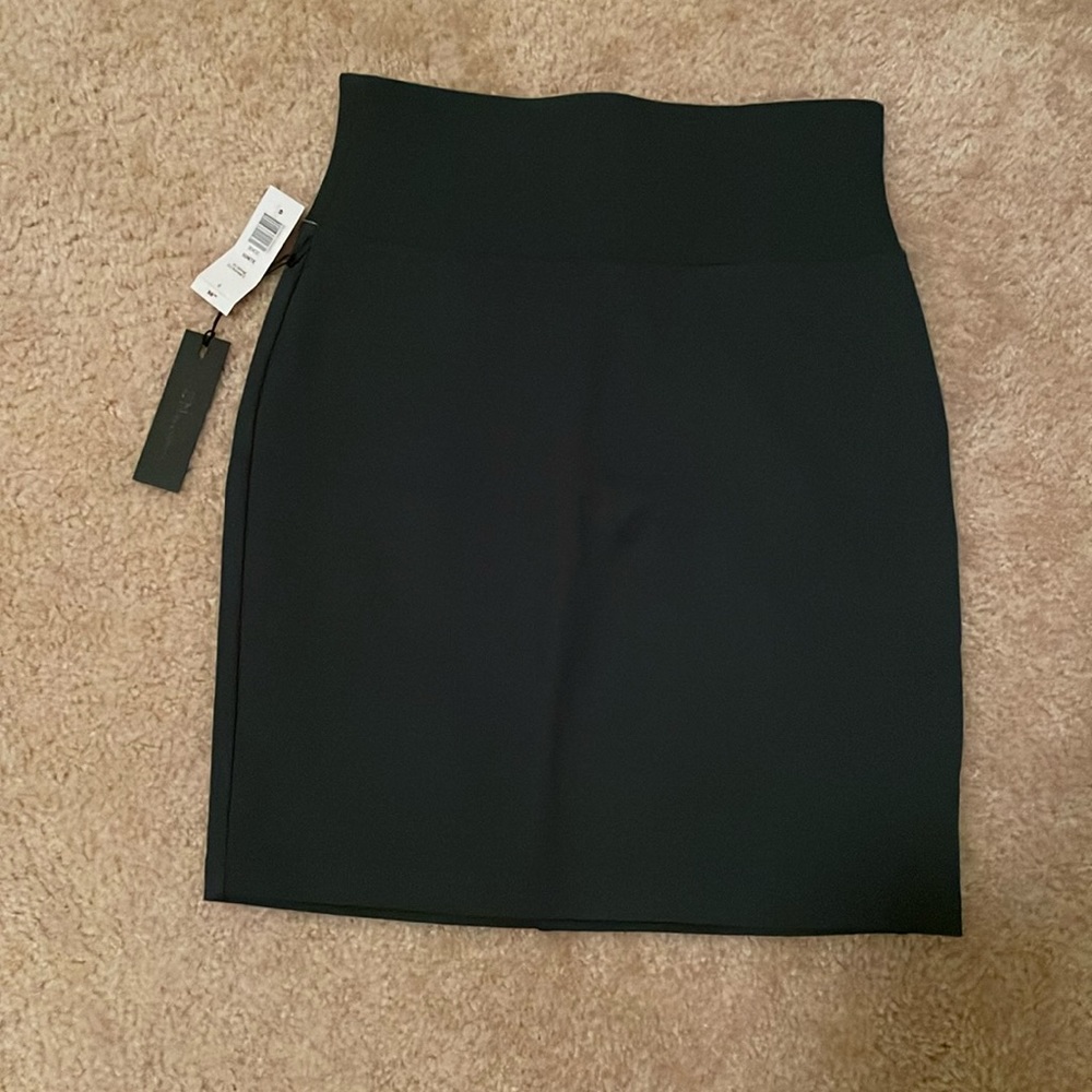 Aritzia Ignite high waisted zip up skirt. NWT